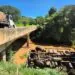 Caminhão cai de ponte após pane elétrica e colisão na MG‑050
